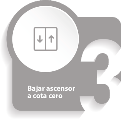 Botón de bajar ascensor a cota cero